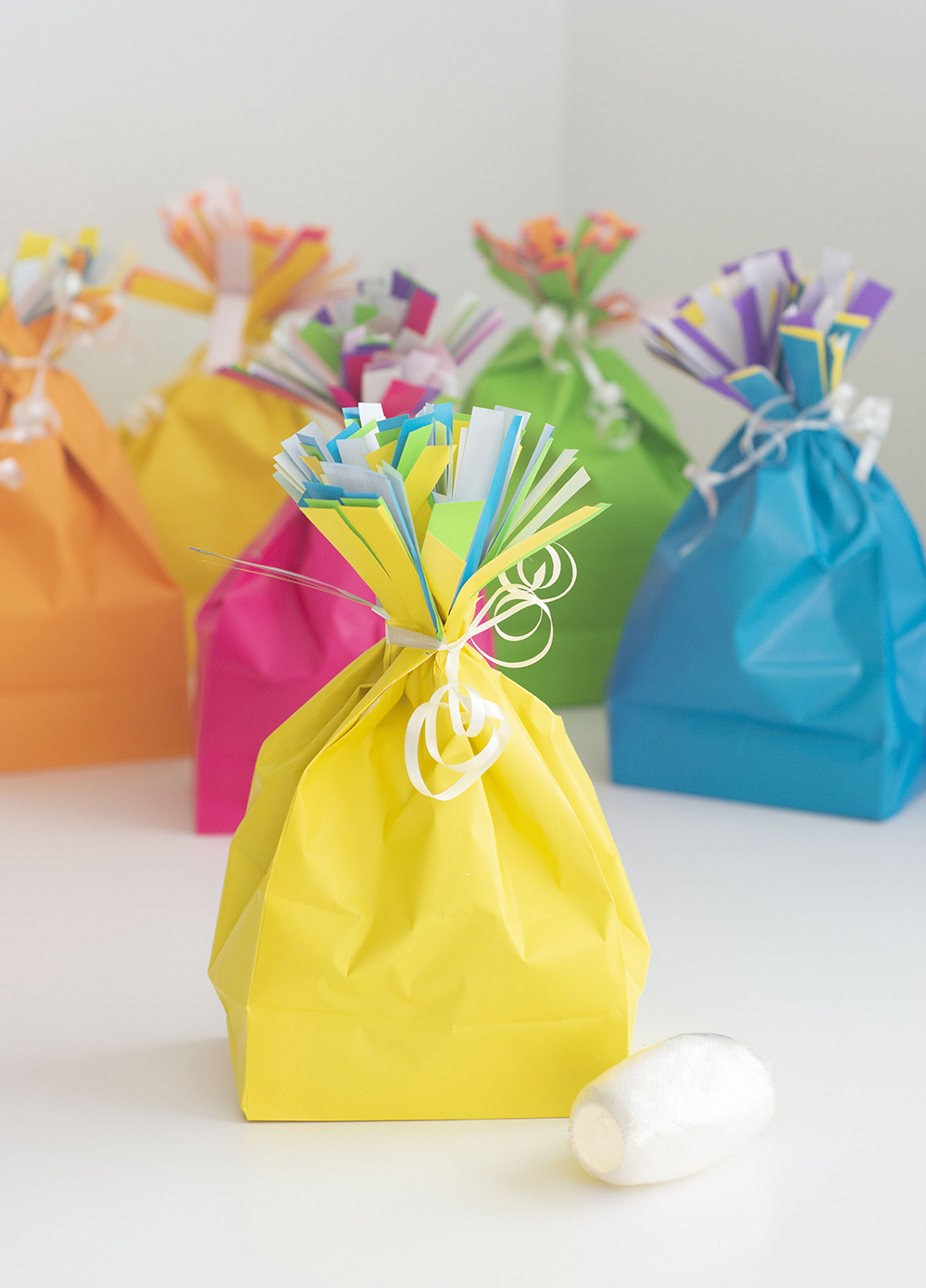 ribbons water paper sack piñatas