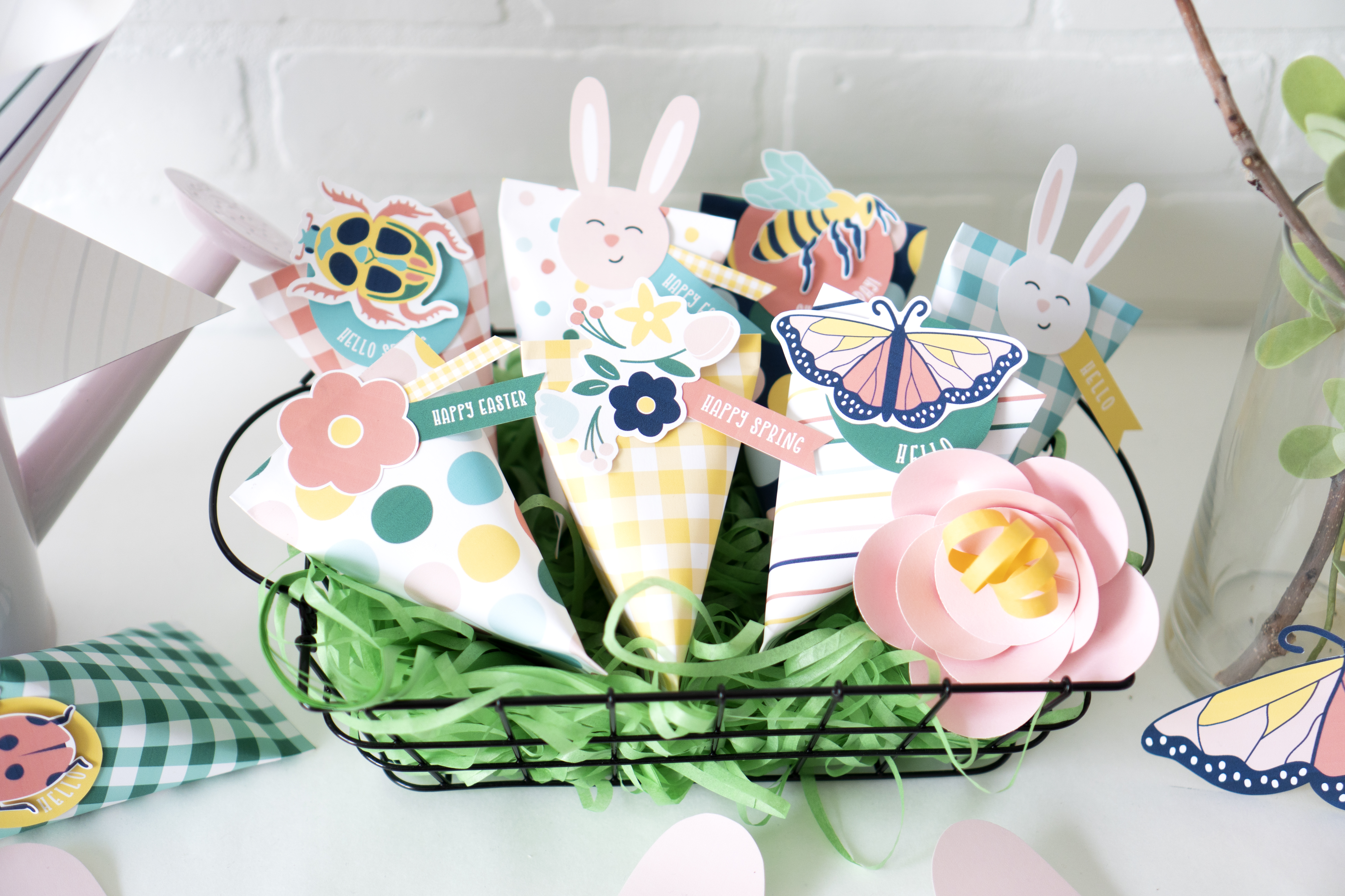 Paper treat boxes made with cardstock and printables from the Easter and Spring Party Pack