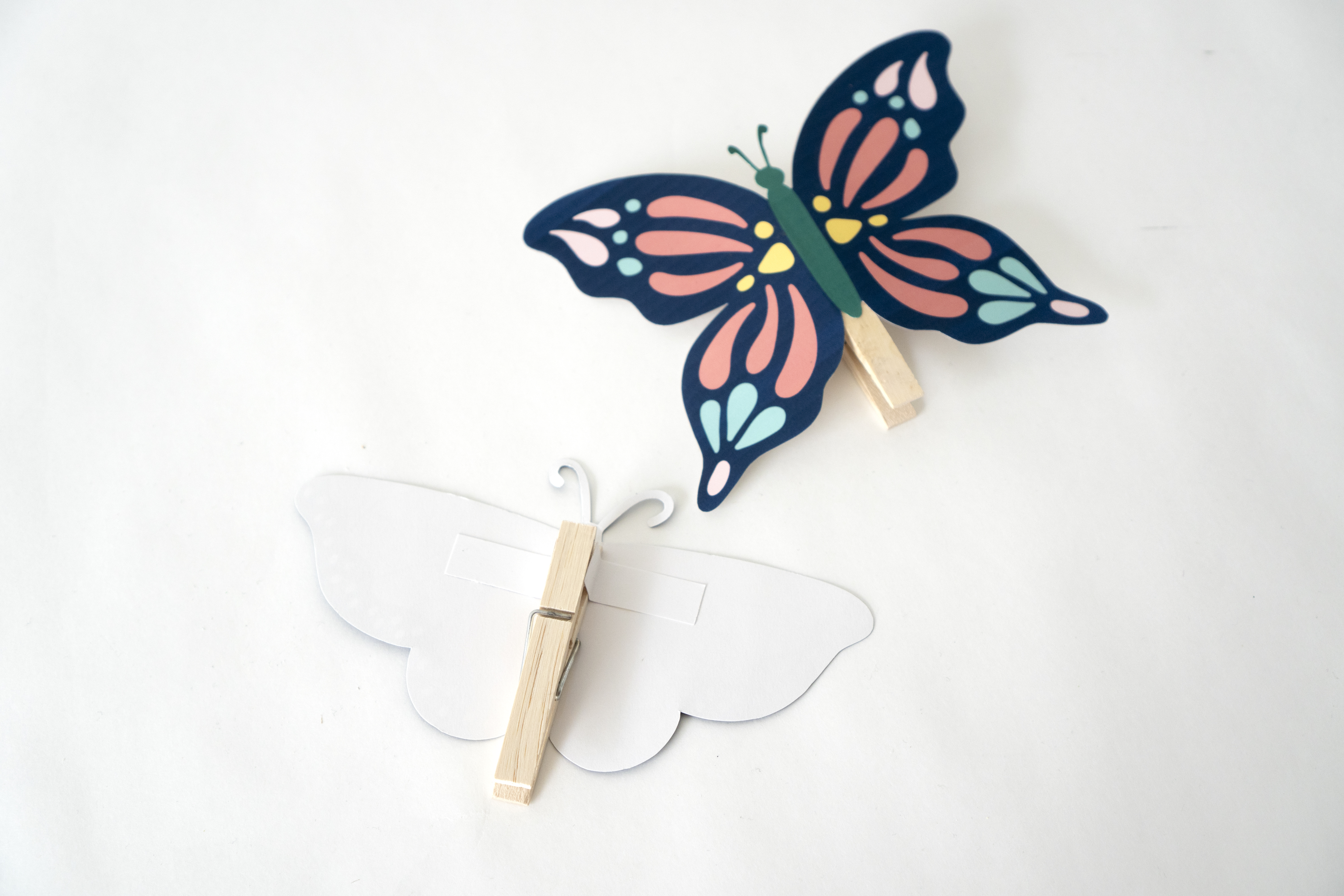 Clothespin butterflies with a printable in the Easter and Spring Party Pack